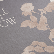Floral design with text on a gray background