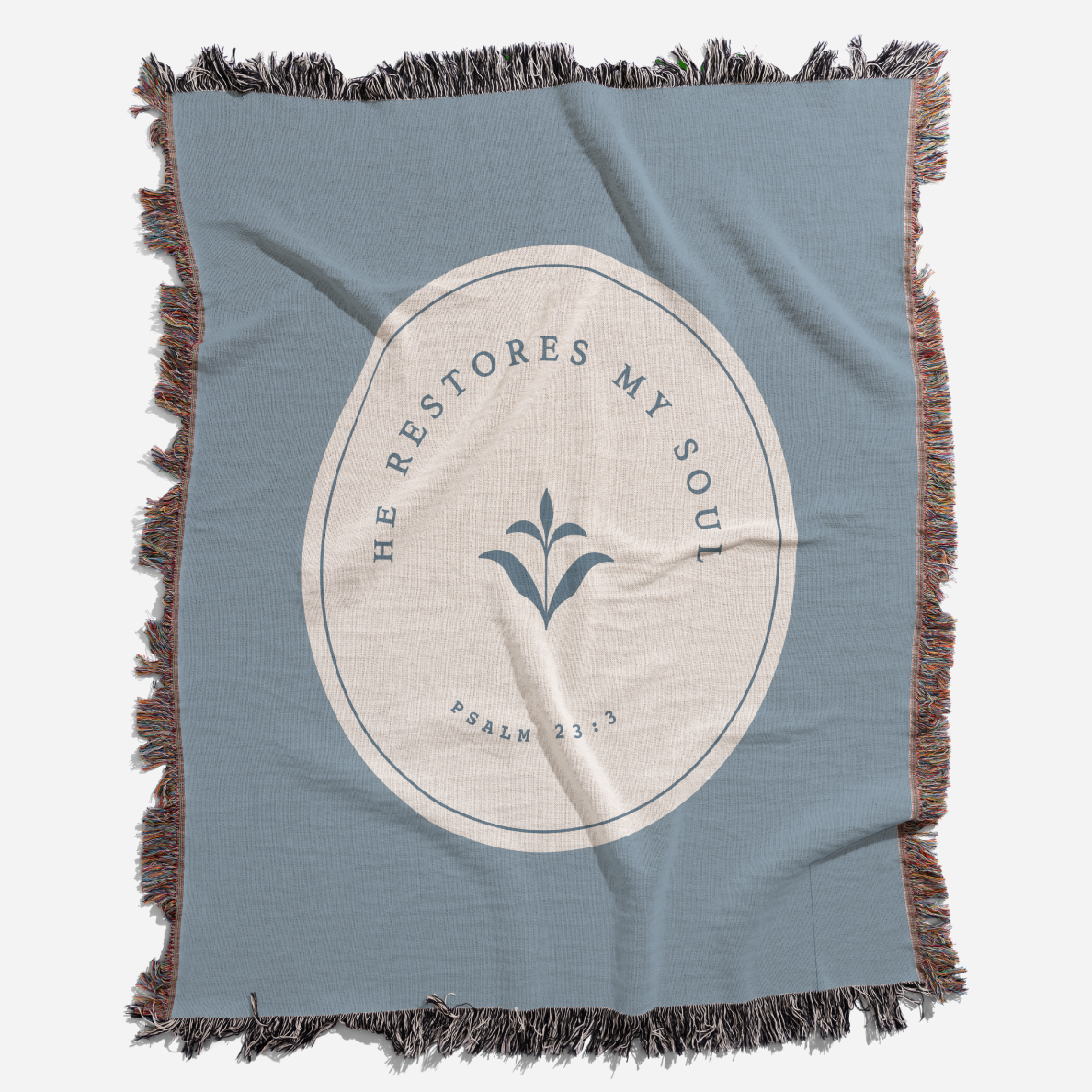 Blue blanket with a circular design and text on a white background