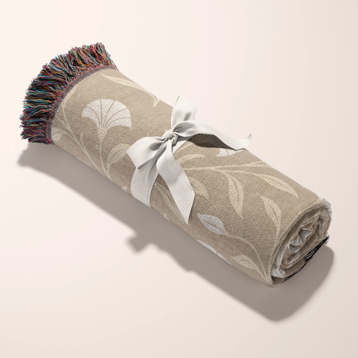 Cream-colored woven blanket with the phrase “Be still and know” from Psalm 46, made of 100% cotton with fringe; a peaceful Christian gift for nurseries or weddings.