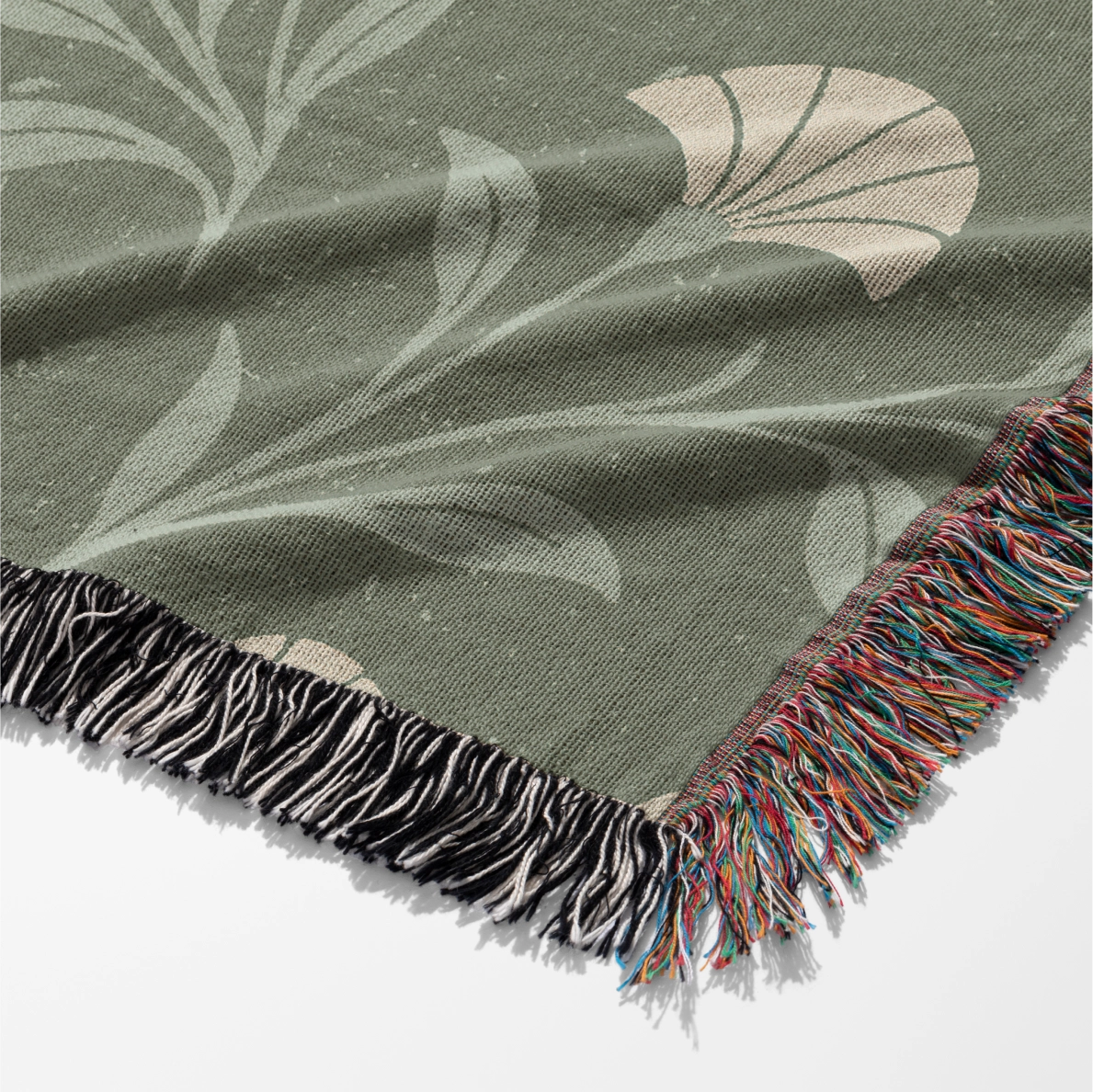 Soft green woven blanket with the phrase “Be still and know” from Psalm 46, 100% cotton with fringe; a peaceful Christian gift for weddings, nurseries, or devotion spaces.
