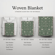 Soft green woven blanket with the phrase “Be still and know” from Psalm 46, 100% cotton with fringe; a peaceful Christian gift for weddings, nurseries, or devotion spaces.
