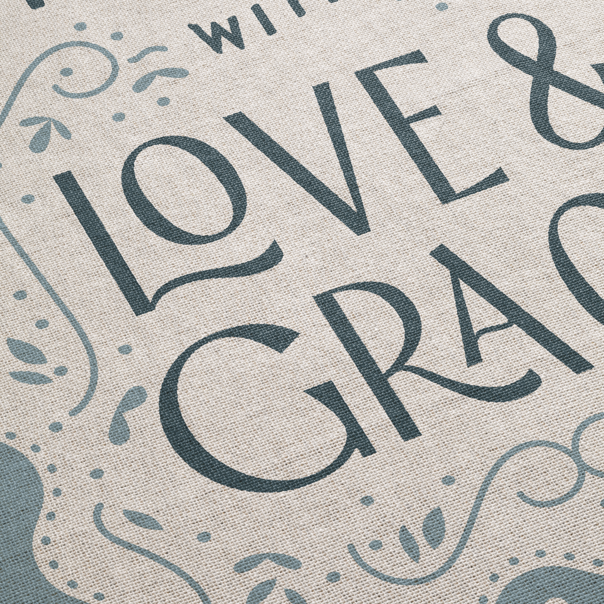 Textured fabric with 'LOVE & GRACE' printed in stylized letters.
