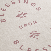 Text pattern with 'Blessings Upon Blessings' on a textured beige background