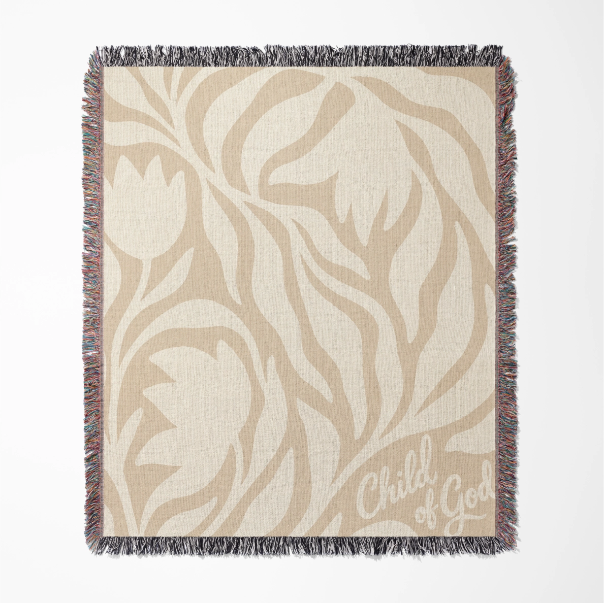 Neutral-toned woven blanket with “Child of God” text and delicate cream foliage design; 100% cotton with fringe, perfect for nurseries, baby gifts, or faith-inspired décor.