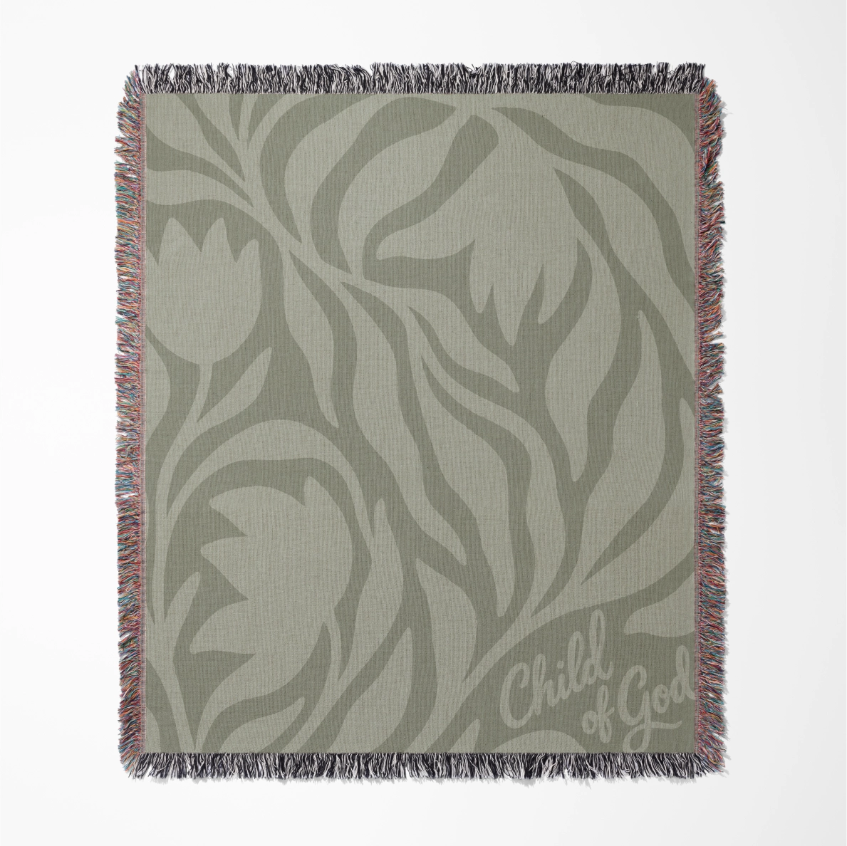 Green earthy-toned woven blanket with foliage pattern and “Child of God” text; made of 100% cotton with fringe, ideal for nurseries, kids’ rooms, or Christian gifts.