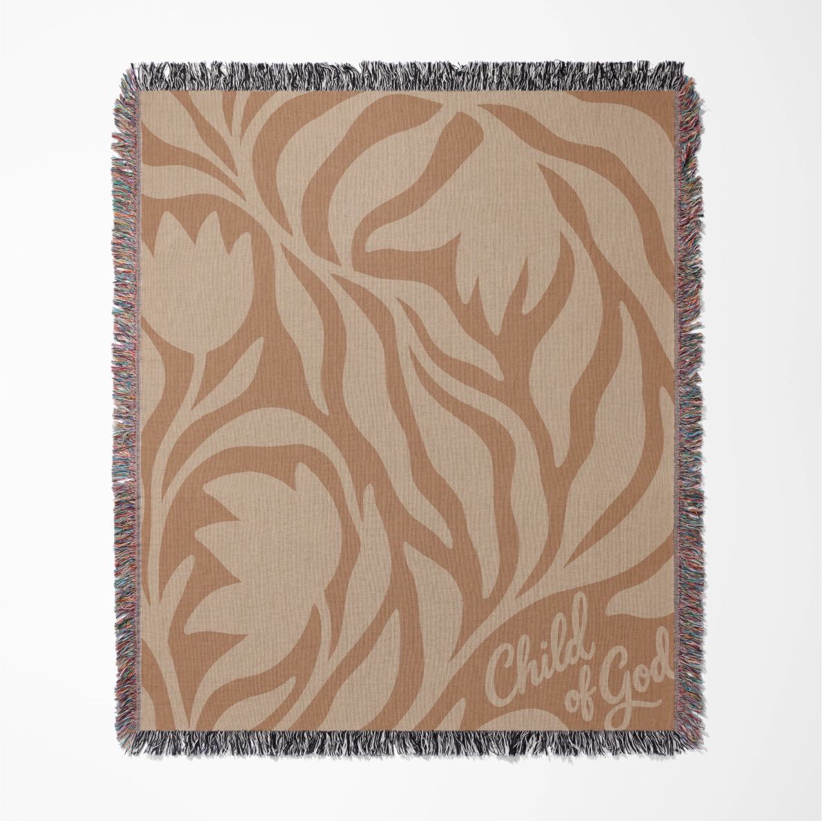 Woven cotton blanket with “Child of God” text and sunset-colored foliage design, finished with fringe; perfect for Christian nursery, baby gift, or faith-based home décor.