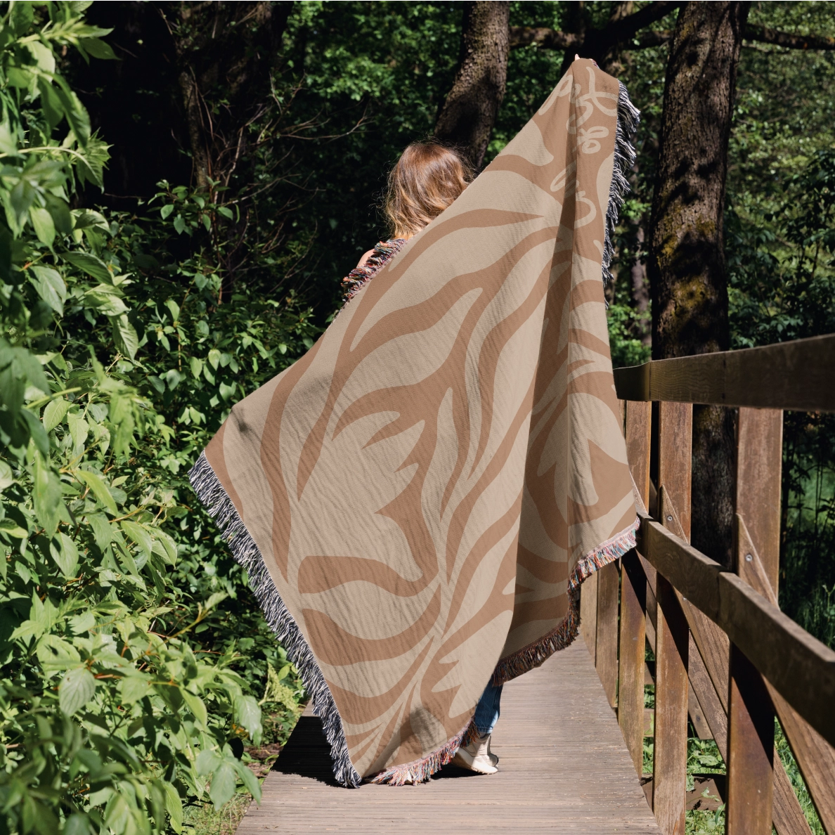 Woven cotton blanket with “Child of God” text and sunset-colored foliage design, finished with fringe; perfect for Christian nursery, baby gift, or faith-based home décor.