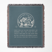 Blanket with floral design and text on a blue background