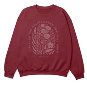 Christian crewneck sweatshirt with “Consider the wildflowers, how they grow” and floral illustration; cozy unisex faith-based design inspired by Luke 12:27.
