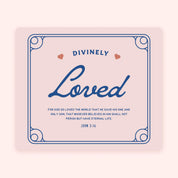 White jar candle labeled “Divinely Loved” with a gold lid. Cinnamon chai scent and Christian message—warm, comforting gift rooted in God’s love.
