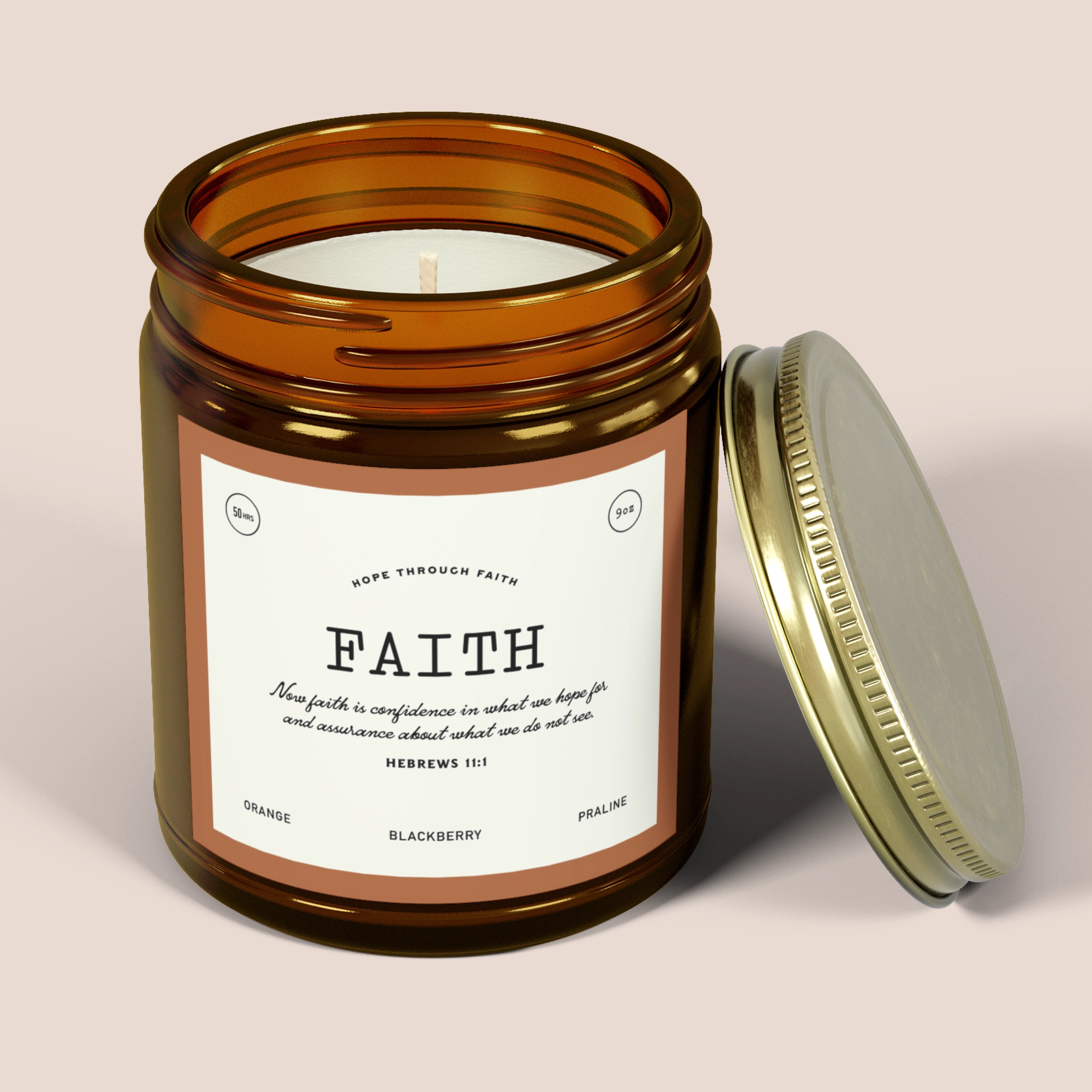 Candle jar labeled “Faith Illuminated” with gold lid. Midnight blackberry scent and Christian message—perfect faith-based gift to inspire light and trust.