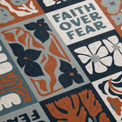 Decorative mat with floral patterns and 'Faith Over Fear' text
