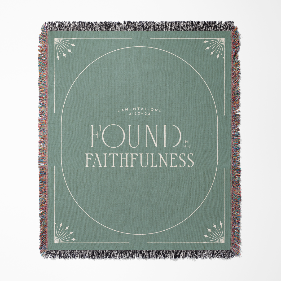 Green woven blanket with 'Found in Faithfulness' text on a white background