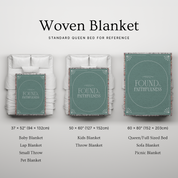 Woven blanket with size chart on a light gray background