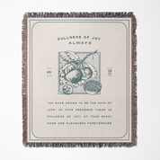 Textile with decorative design and text on a beige background