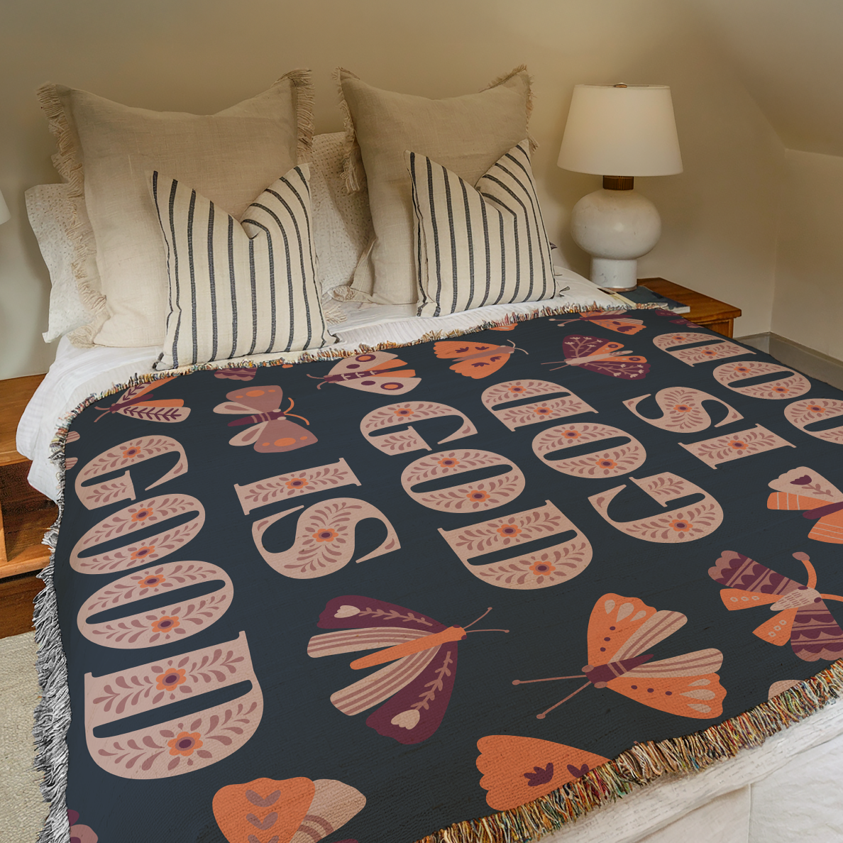 God is Good blanket on bed.