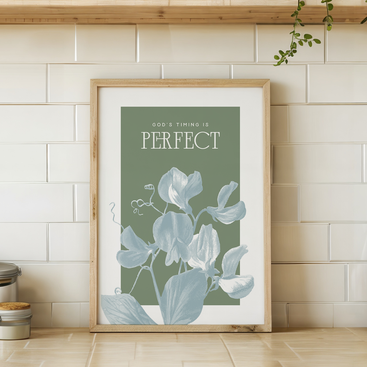 Framed artwork with floral design and text on a tiled wall