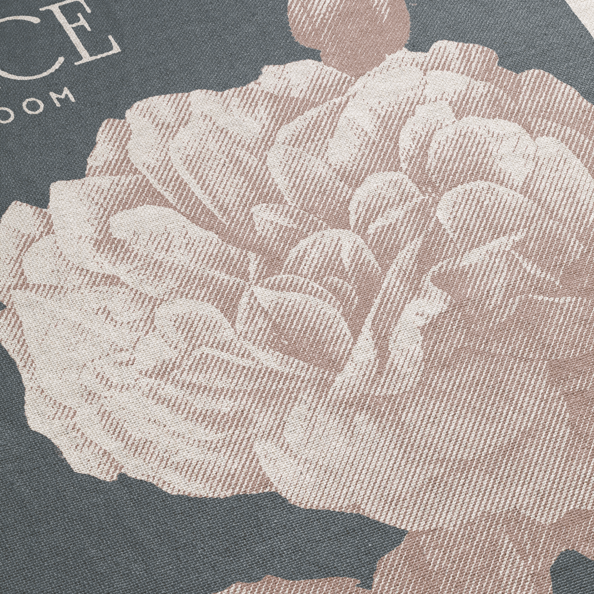 Close-up of a textured fabric with floral pattern on a dark background