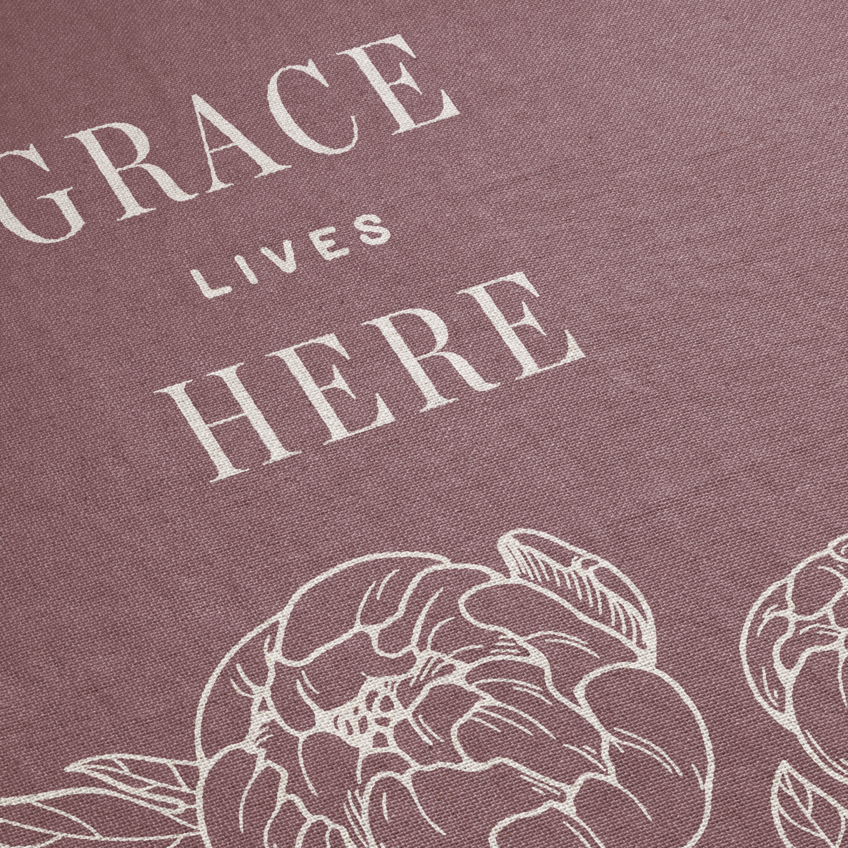 Text 'GRACE LIVES HERE' with floral design on a textured purple background