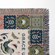 Faith-inspired woven blanket featuring the phrase “Grace Upon Grace” with colorful fringed edges, perfect for Christian home decor and gifts.