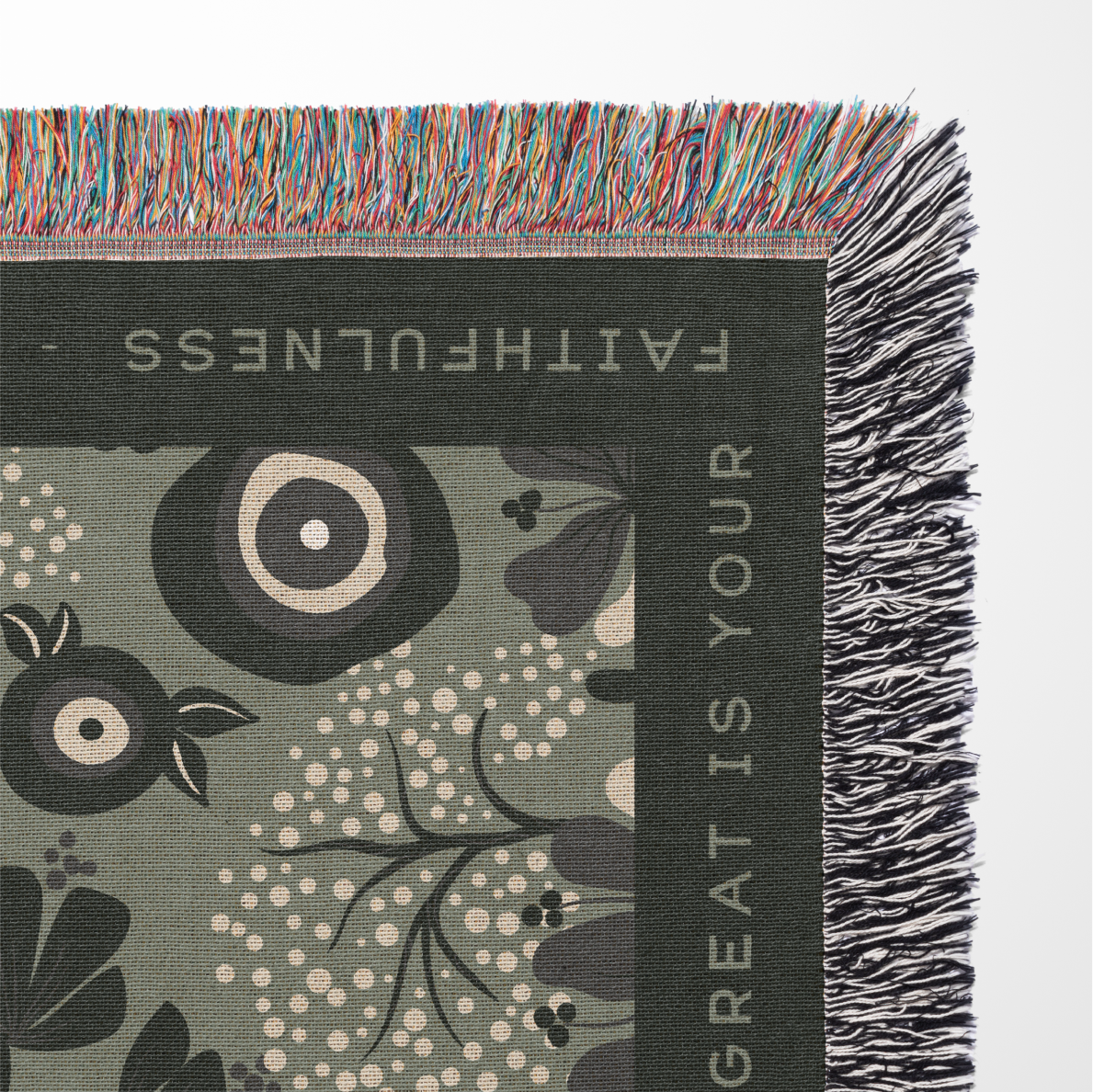 Textile with floral design and text on a green background