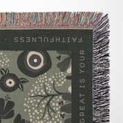 Textile with floral design and text on a green background