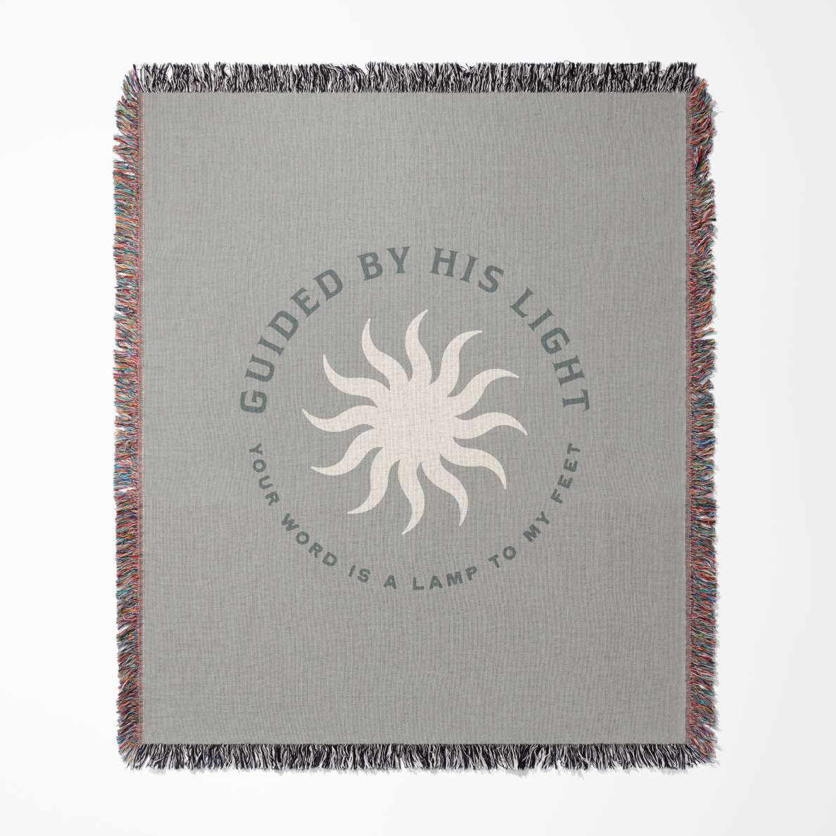 Gray blanket with sun design and text on a white background