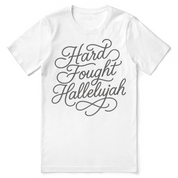 Christian t-shirt with hand-lettered “Hard Fought Hallelujah” design; unisex cotton tee for faith, perseverance, and praise through hardship.