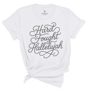 Unisex Christian t-shirt with hand-lettered “Hard Fought Hallelujah” text; soft cotton faith-based shirt for worship, encouragement, and praise through trials.