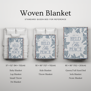 Woven blanket with floral design and text, shown in various sizes on a light gray background.