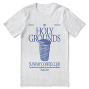 Christian t-shirt with “Holy Grounds Sunday Morning Coffee Club” in retro script; unisex cotton tee for faith, fellowship, and coffee-loving believers.