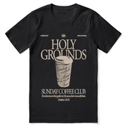 Christian t-shirt with “Holy Grounds Sunday Morning Coffee Club” in retro script; unisex cotton tee for faith, fellowship, and coffee-loving believers.