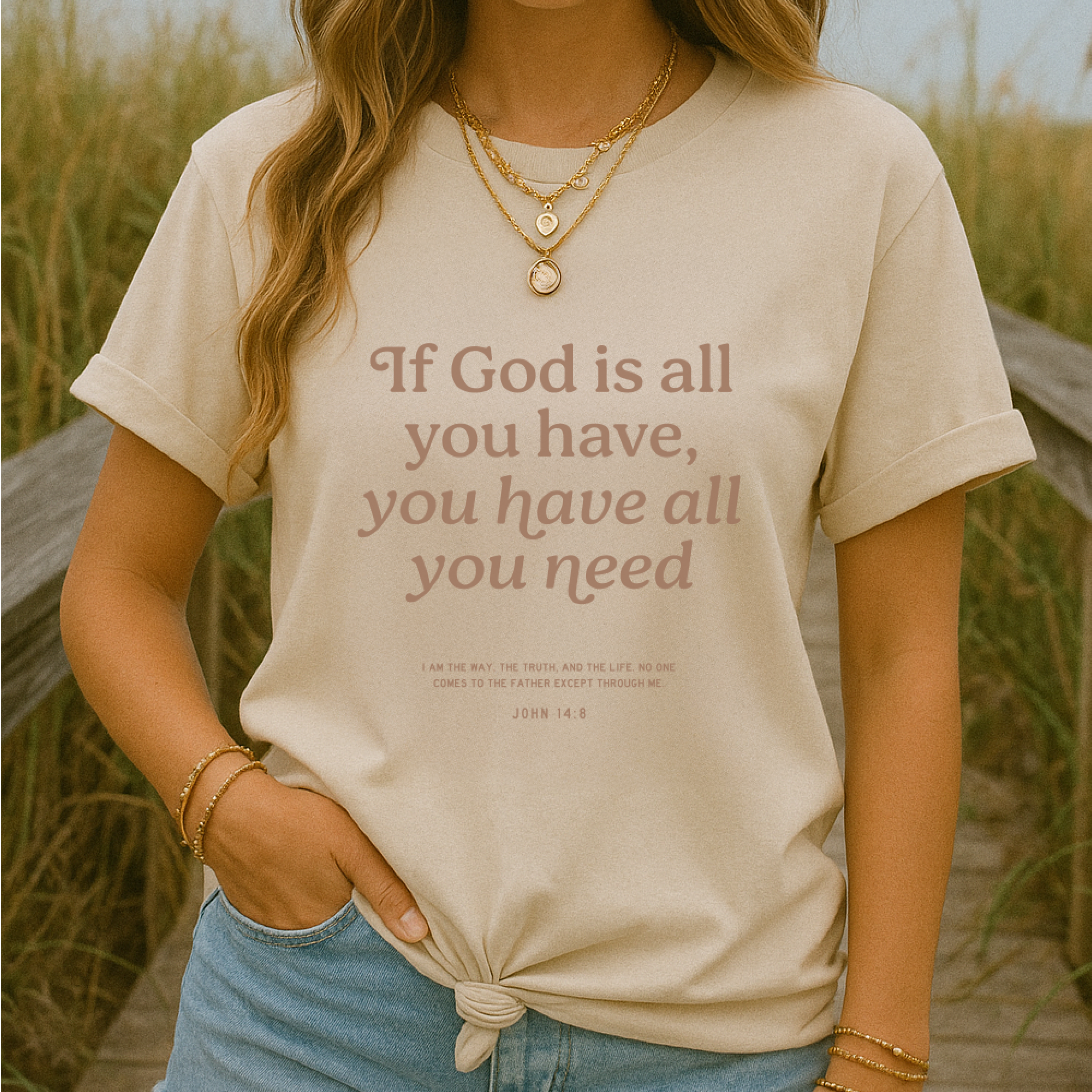 Christian t-shirt with the phrase “God Is All You Need” in modern lettering; unisex faith tee offering encouragement and trust in God’s sufficiency.

