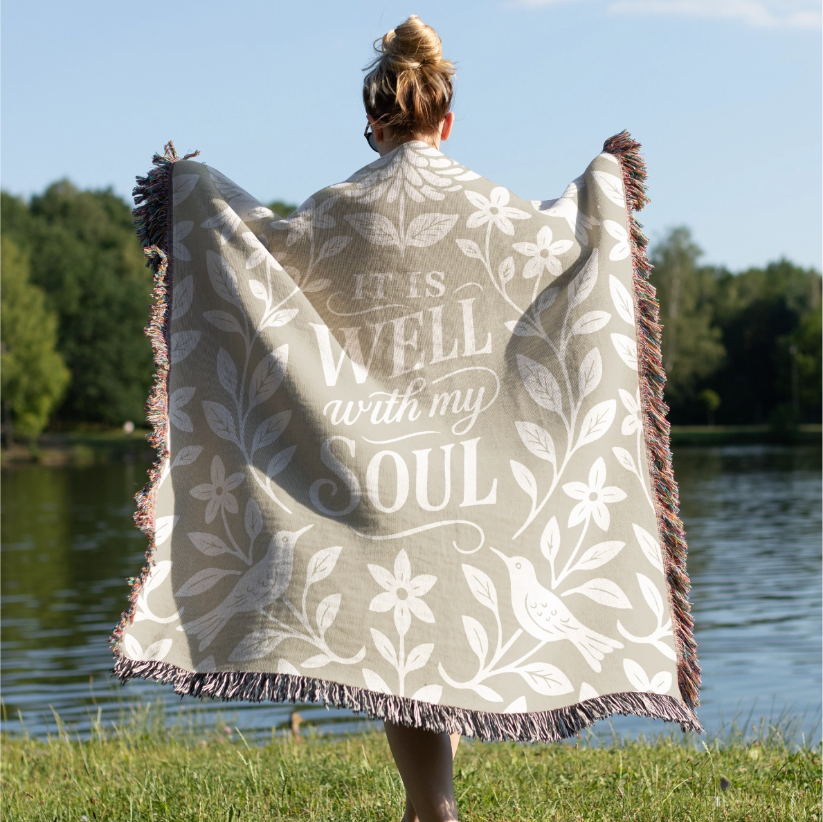 Earthtone green and cream woven blanket with “It is well with my soul,” birds, and floral accents; 100% cotton Christian throw with fringe for peaceful home décor.