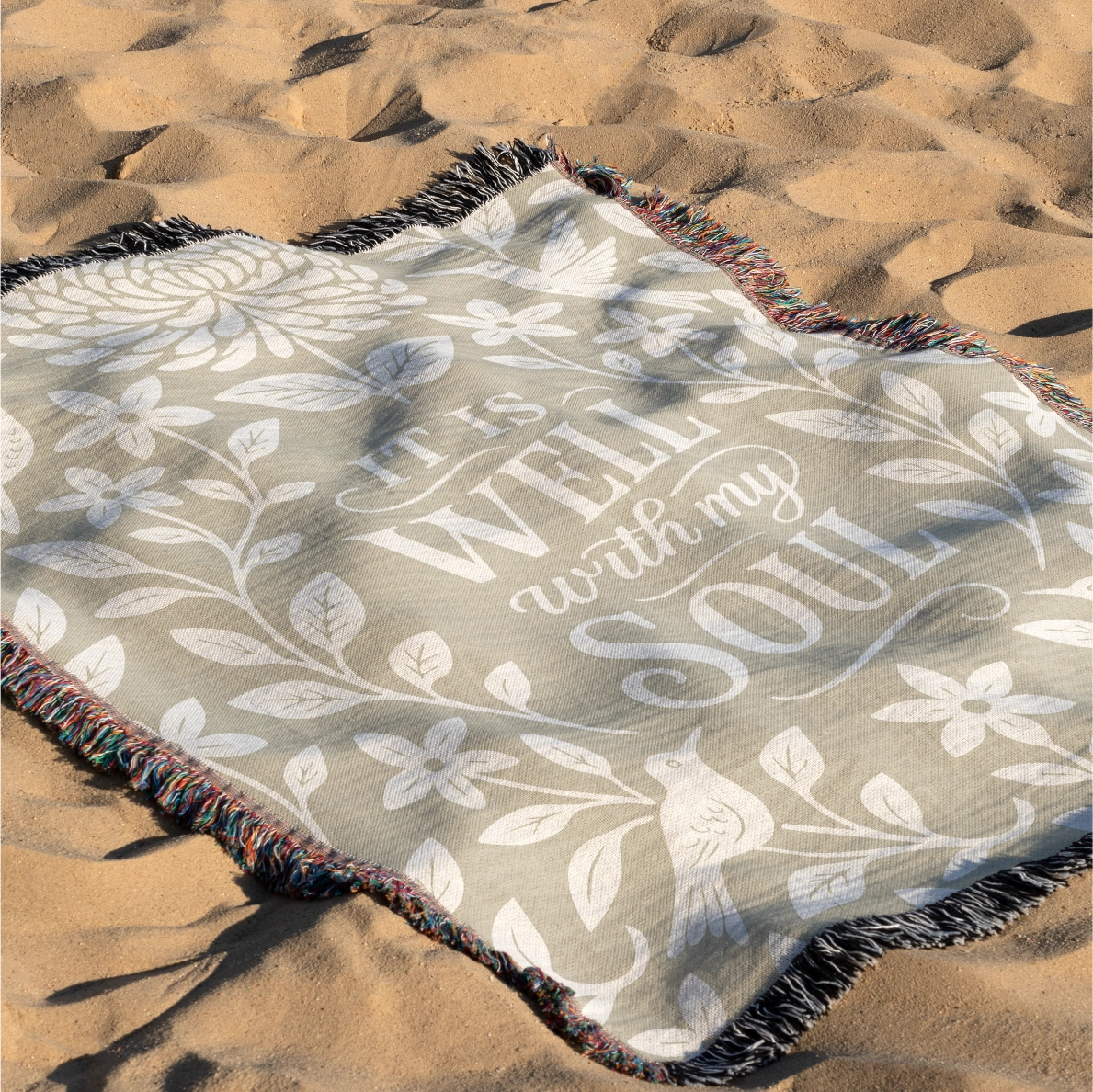 Earthtone green and cream woven blanket with “It is well with my soul,” birds, and floral accents; 100% cotton Christian throw with fringe for peaceful home décor.
