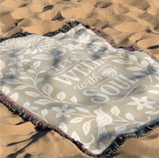 Earthtone green and cream woven blanket with “It is well with my soul,” birds, and floral accents; 100% cotton Christian throw with fringe for peaceful home décor.