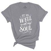 Christian t-shirt with hand-scripted “It Is Well With My Soul” text; soft unisex cotton tee inspired by hymn lyrics, perfect for peace-filled everyday faith and gifting.