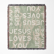 Blanket shot that says Jesus Loves You.