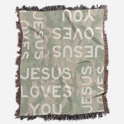 Studio photograph of Jesus Loves You blanket.