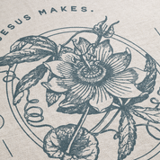 Decorative design with a flower and leaves on a textured background