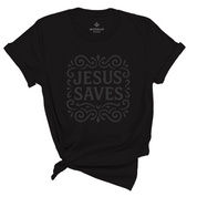 Unisex Christian t-shirt with decorative hand-lettered “Jesus Saves” design; soft cotton faith-based shirt perfect for daily wear, church, or joyful witness.