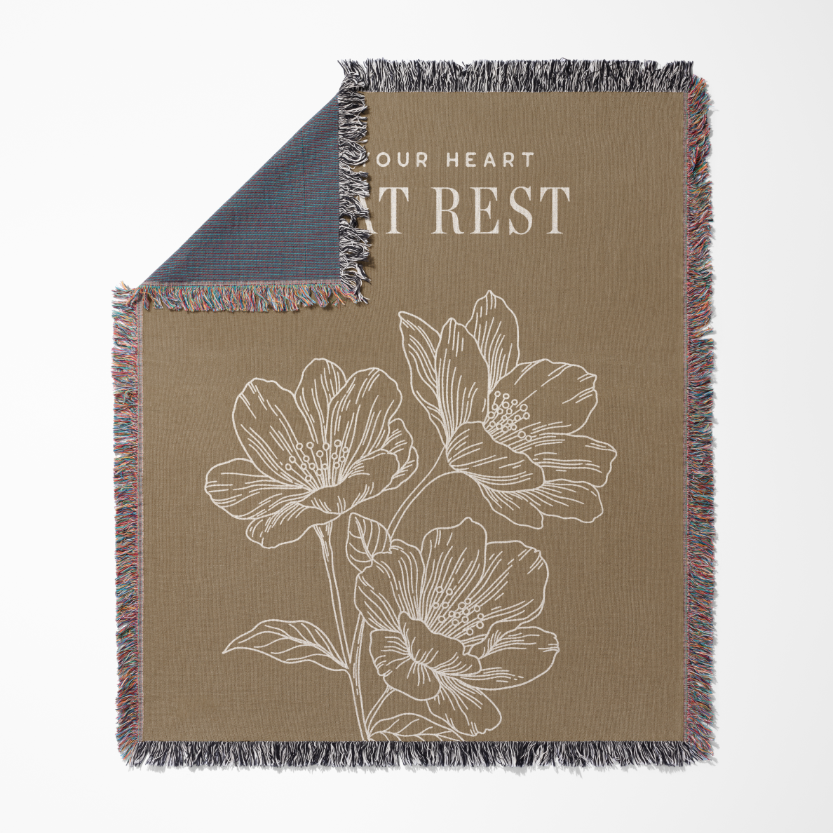 Floral-patterned blanket with text on a beige background