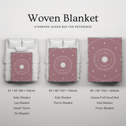 Woven blanket with size chart on a light gray background