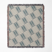 Woven Christian blanket featuring loaves and fishes pattern inspired by the miracle of Matthew 14; 100% cotton with fringe, a symbol of God’s provision and abundance.