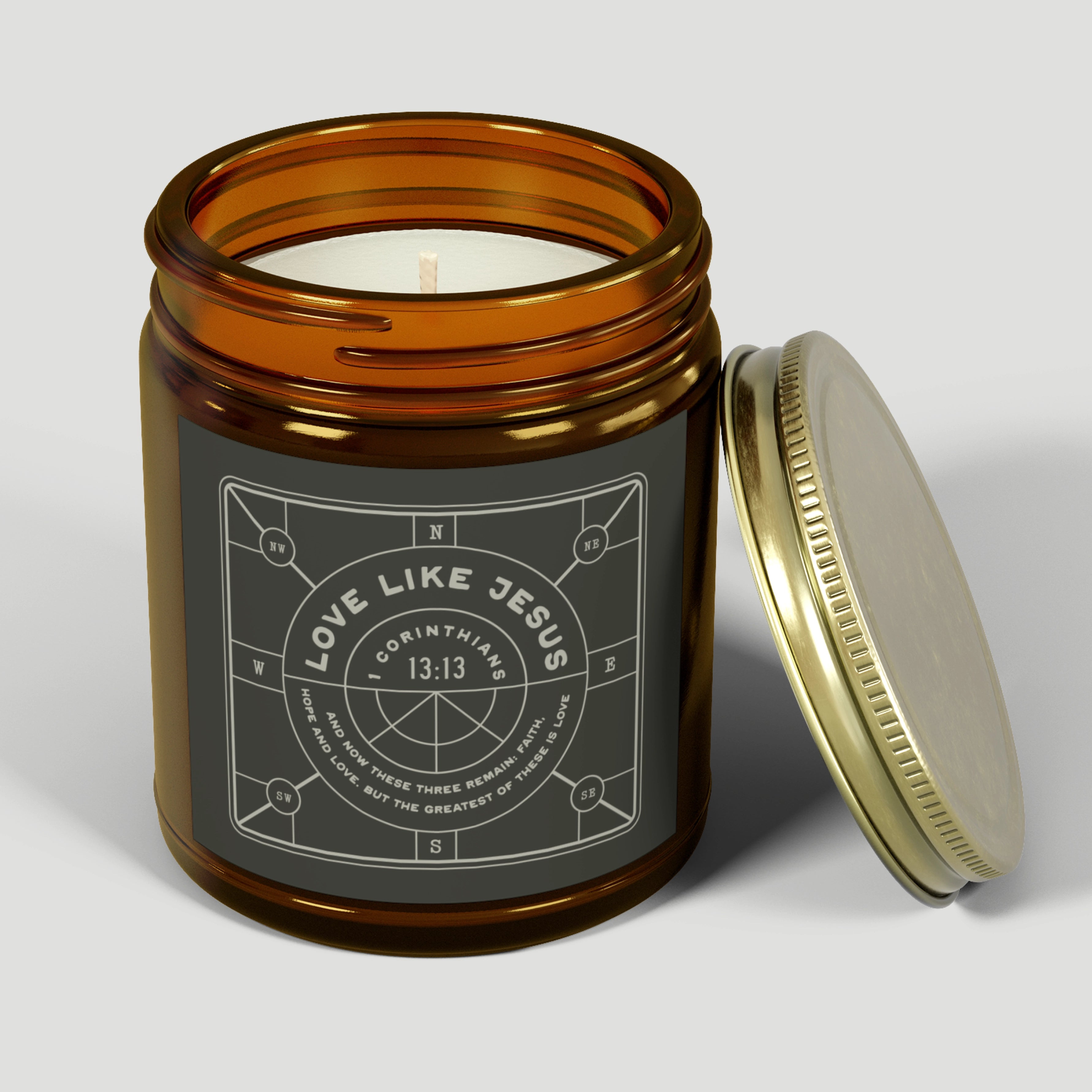 Brown jar candle labeled “Love Like Jesus” with a gold lid. Fraser Fir scent and Christian message—fresh, faith-filled gift to reflect Christ’s love daily.
