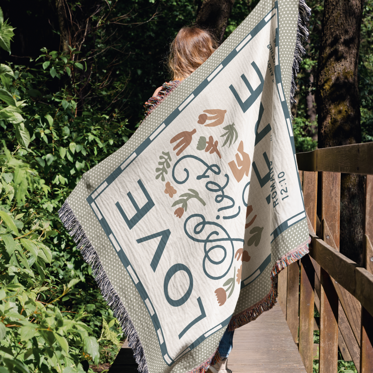 love-lives-here-woven-blanket-devoted-home-held.png