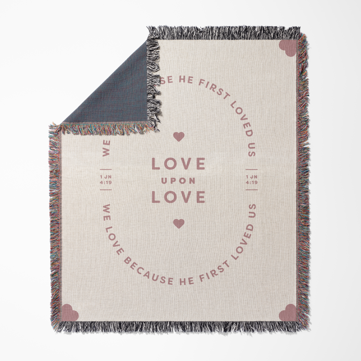 Blanket with text and heart designs on a white background