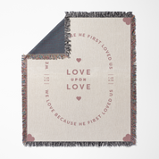 Blanket with text and heart designs on a white background