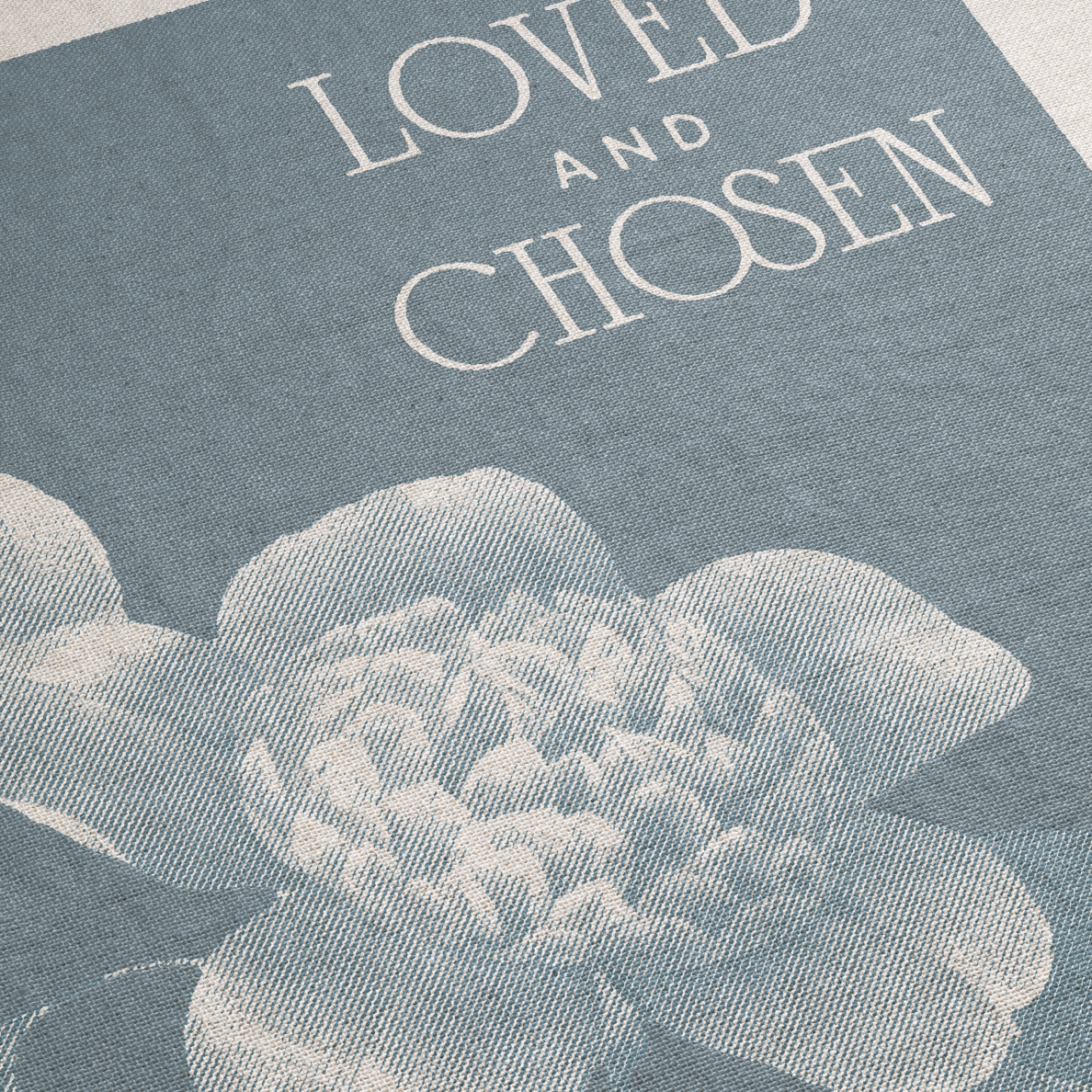 Text 'LOVED AND CHOSEN' on a blue background with floral design
