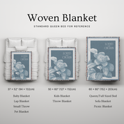 Woven blanket with floral design on a light gray background, showing different sizes.